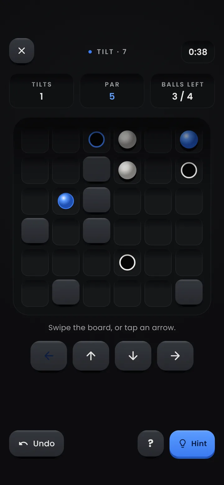 Tilt puzzle: a board with blue and white balls to roll into their holes, par 5.